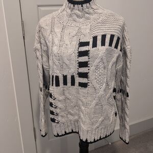 Elegant Monochrome Cable Knit Sweater